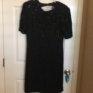 Black sequined low back cocktail dress
